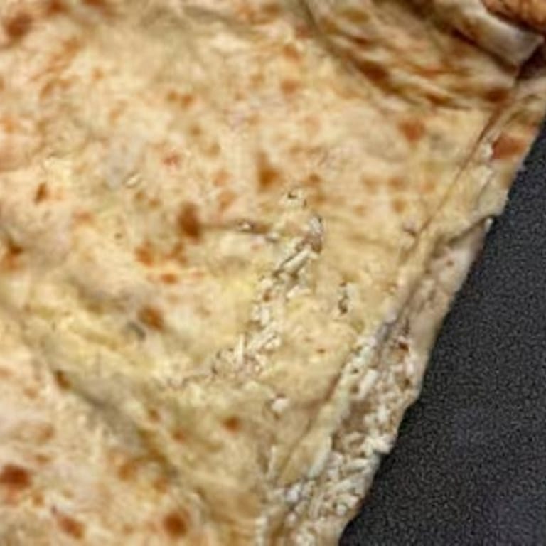 Savor our authentic naan